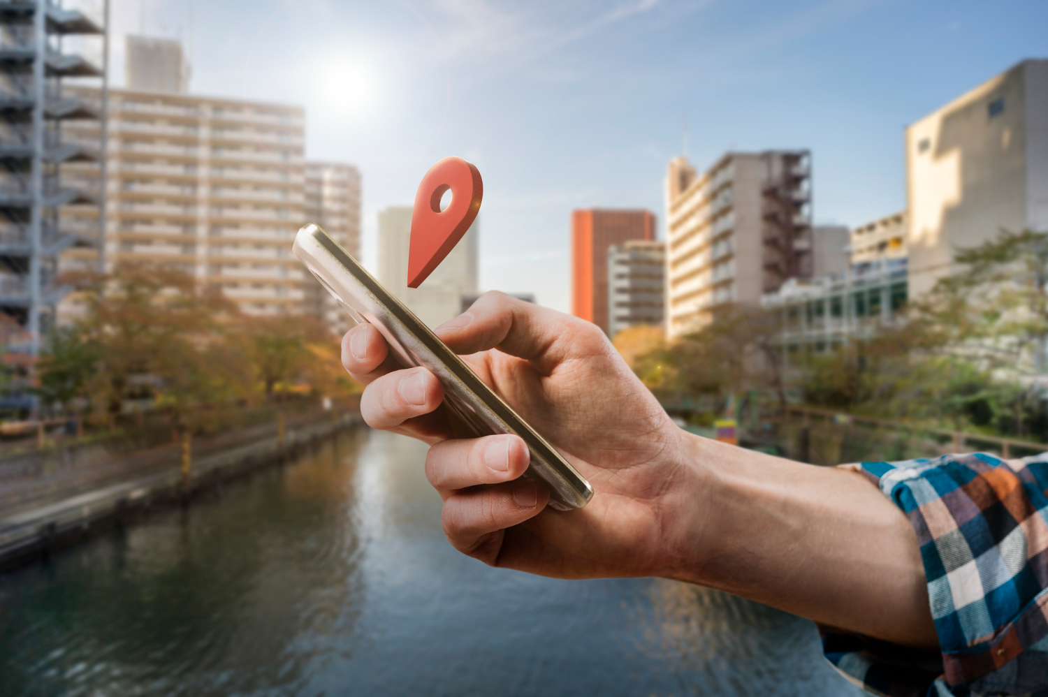 Phone with location pin showing how local SEO for small business supports nearby searches