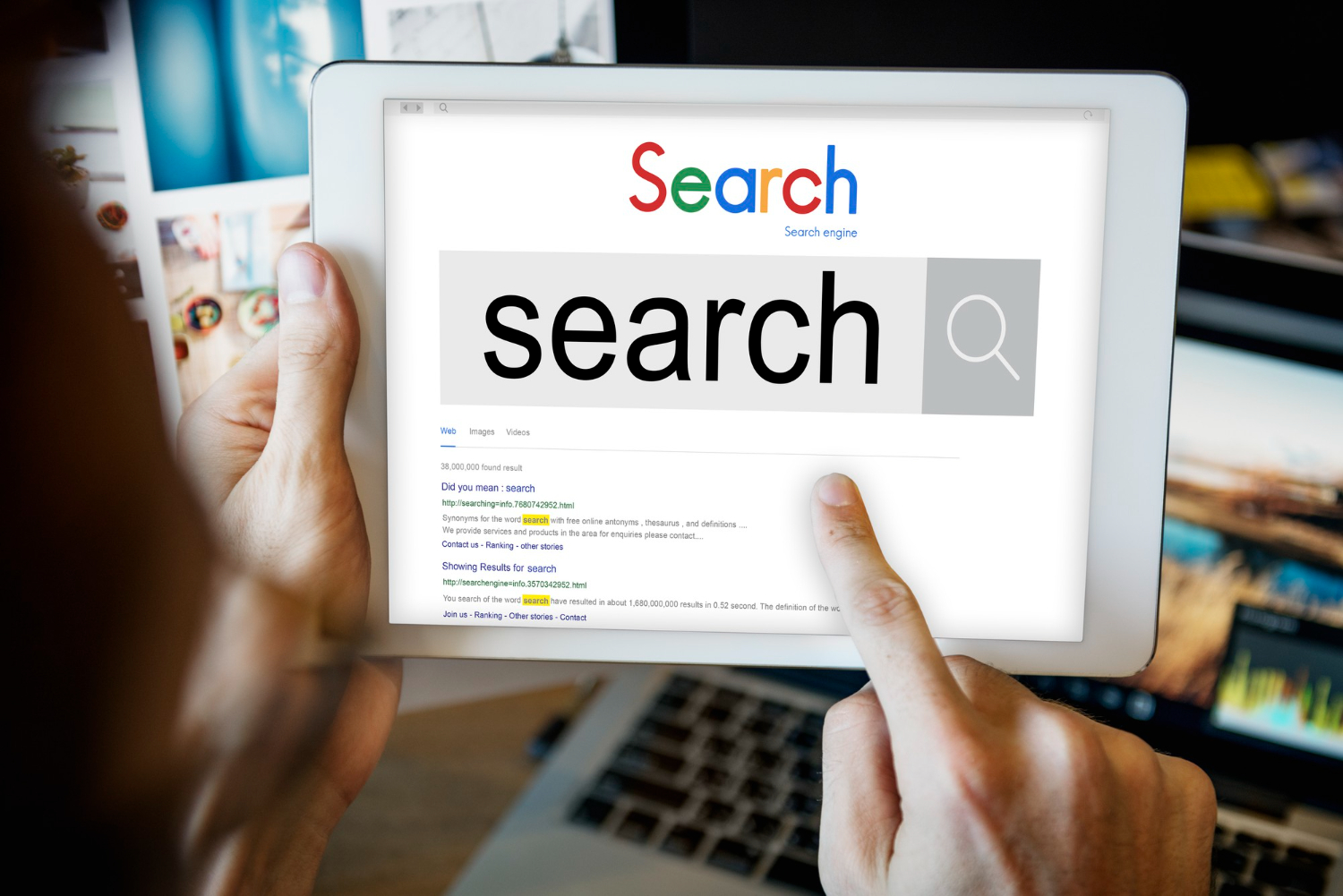What AI-First SEO Specialists Track Beyond Google Rankings 1 AI-first SEO specialists reviewing online search results on a tablet